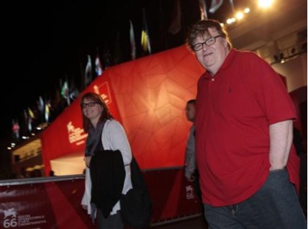 1864257261-us-filmmaker-michael-moore-right-arrives-at-the-66th-edition []