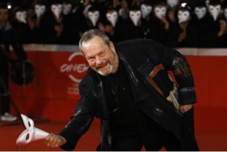 1106813238-u-s-movie-director-terry-gilliam-holds-mask-on-the []