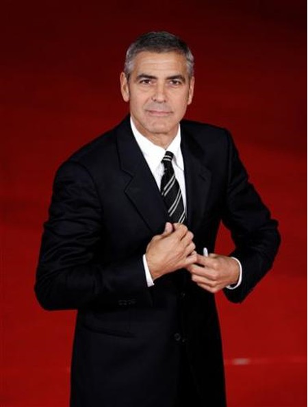 1755779404-george-clooney-walks-the-red-carpet-on-the-occasion-of []