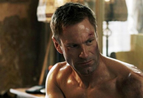 The Expatriate, immagini del thriller con Aaron Eckhart