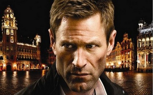 The Expatriate, primo trailer e poster dell'action-thriller con Aaron Eckhart